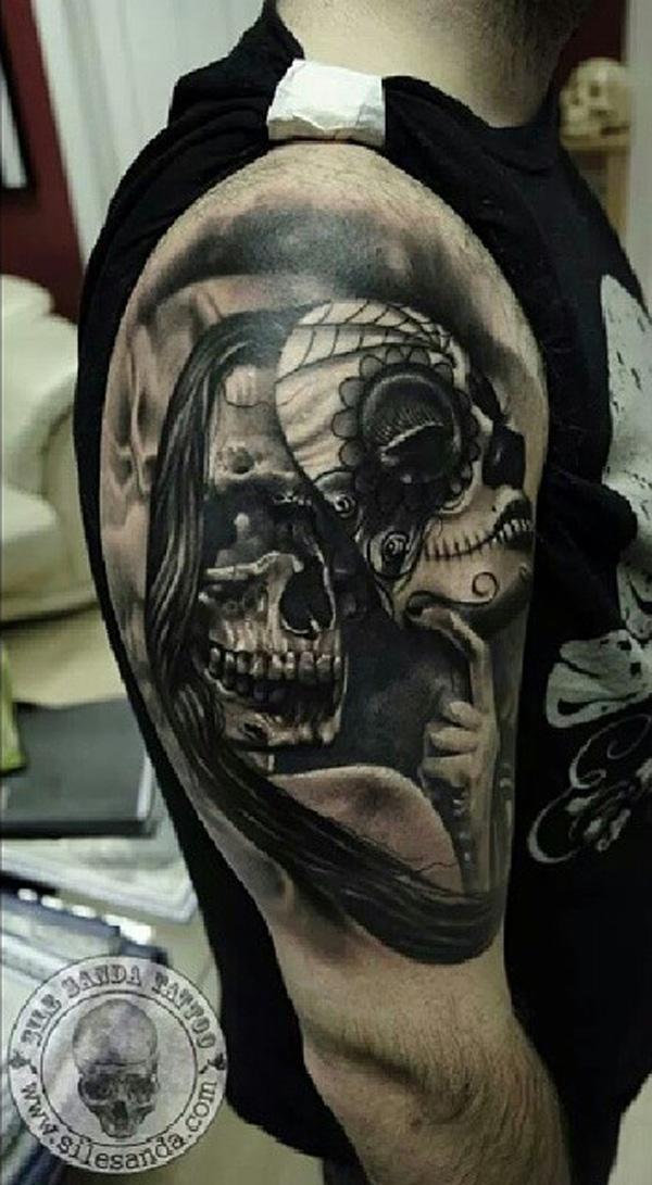  64 Skull with mask tattoo on sleeve 