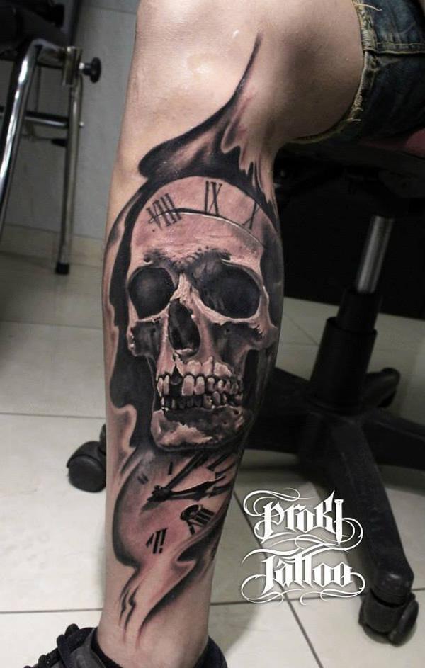  71 Skull with clock tattoo on his leg for men 