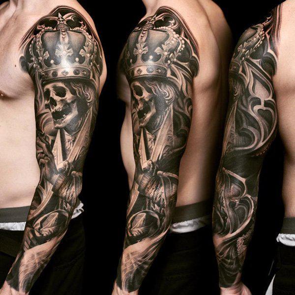 89 skull and crown sleeve tattoo 