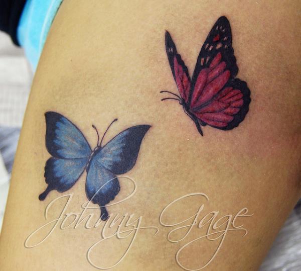 butterflies on thigh tattoo600 539