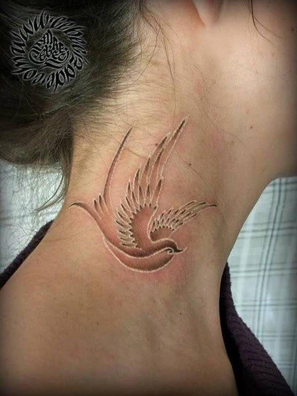 Small Bird Tattoo On Neck