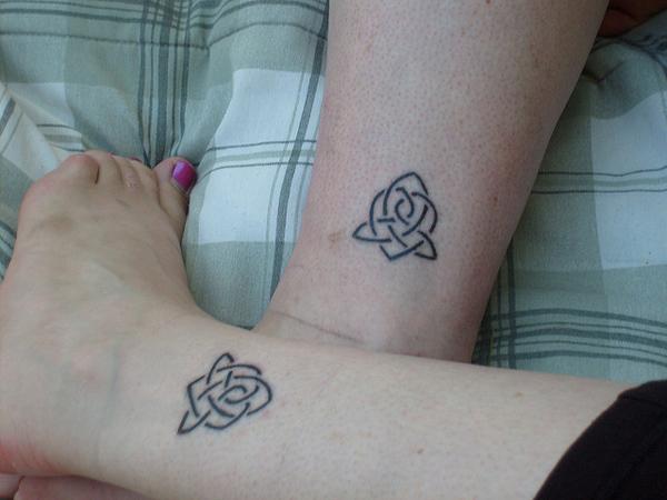 knot of love tattoos for sisters - The knot is the best symbol to represent the bond of siblings. The Celtic inspired tattoo integrates a heart symbol into the Celtic Trinity Symbol.