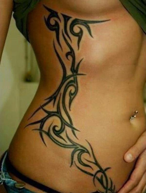 bộ lạc sườn xăm cho trẻ em gái - Tribal tattoo đã vượt ra ngoài ý nghĩa truyền thống của nó.  Nữ tính, dễ thương và cực kỳ xinh đẹp là chủ đề của tác phẩm.