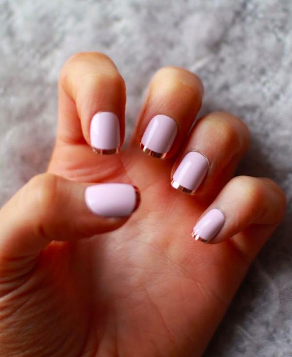 Play around with more metallic colors with your French tip manicure. Start off with a plain white polish as your base. Then thinly tip your nails with metallic gold polish to complete the elegant look.