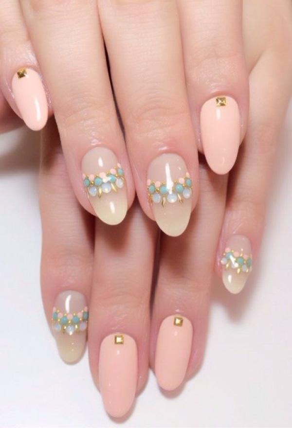 Beads all the way! These nails talk fashion! If you want to stand out from the crowd go ahead with this nail art look. Partner baby colored beads on your nails with a combination of nude and melon shades of acrylic paint plus golden beads. Pull up some hip outfits and you’re picture perfect! 