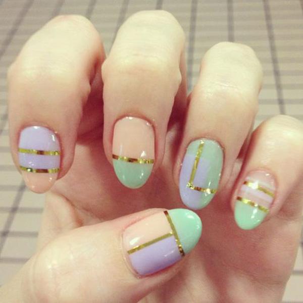 55 Gorgeous Metallic Nail Art Designs And Design Adorable Baby Colored Polishes In Green And Periwinkle Topped By Metallic Gold Strips