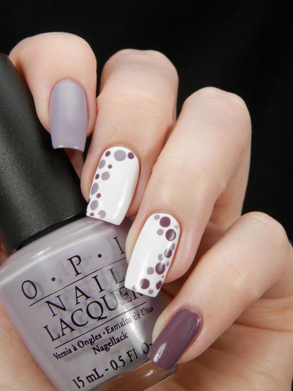 Olive has never looked so classy in this matte and polka dot inspired nail art design