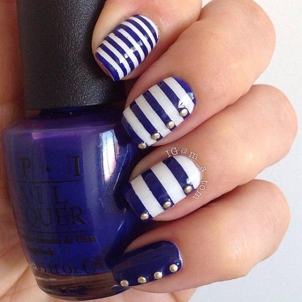 50 Blue Nail Art Designs Art And Design Blue striped button themed nail art design. Dark blue and white polish is used on ... - 50 Blue Nail Art Designs Art And Design