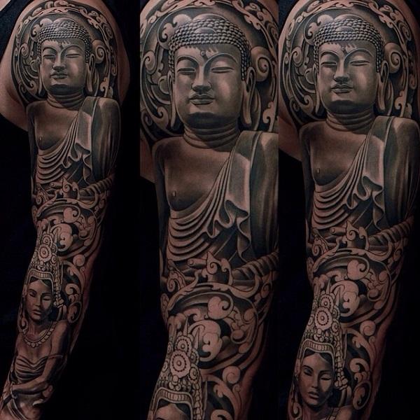 This full sleeve tattoo of Buddha is enchanting with the details and careful strokes of curves. The highlights and shadows make a 3D effect and a show of being enlightened.
