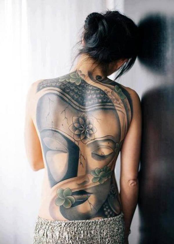 Another full back tattoo with a Buddha portrait. This has more femininity and purity so it could be great for women looking for an inspiring back tattoo.
