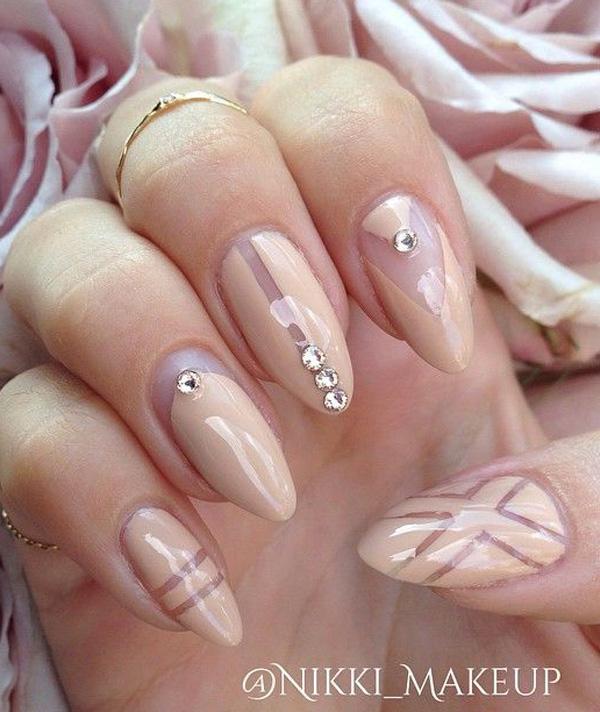 Wonderful looking nude nail art for long nails. You can add more designs when you’re working on nude nail polish with long nails. Add on silver beads on top as well as geometric shapes on the polish.