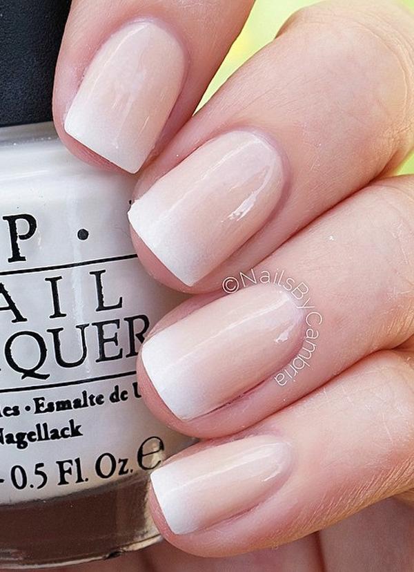 Gradient inspired nude nail art design. The gradient from nude polish to white on the tips is simply stunning and makes the hand glow so much more.