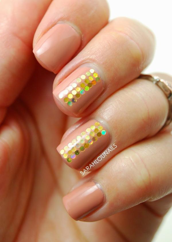 Nude nail art with sequins. Line art colorful sequins on your nails above the nude nail polish for effect,