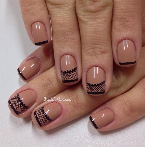Nude and black lace inspired nail art design. Make your nude nail polish unique by adding lace details on the tips using thin strokes of black nail polish.