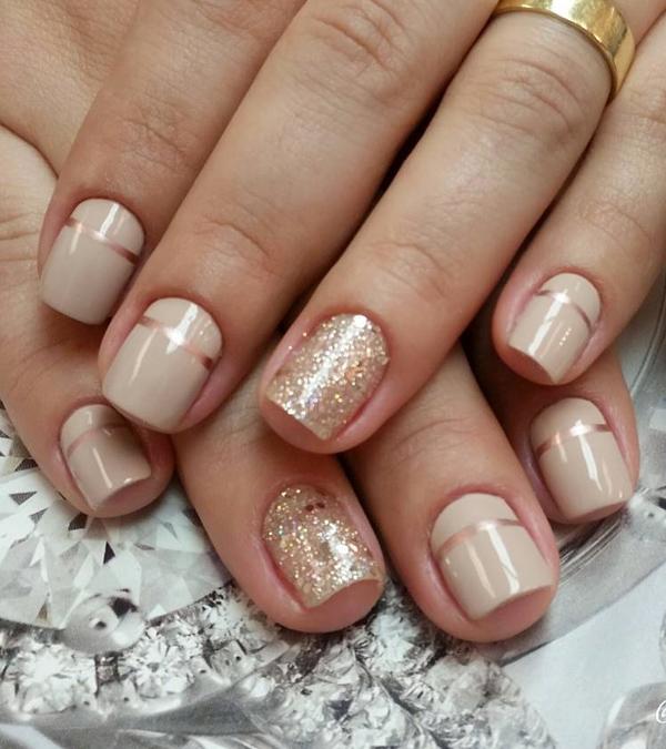 Nude and metallic gold nail art design. These two combinations of colors always go perfect with each other. Bring in gold glitter to make things even more interesting