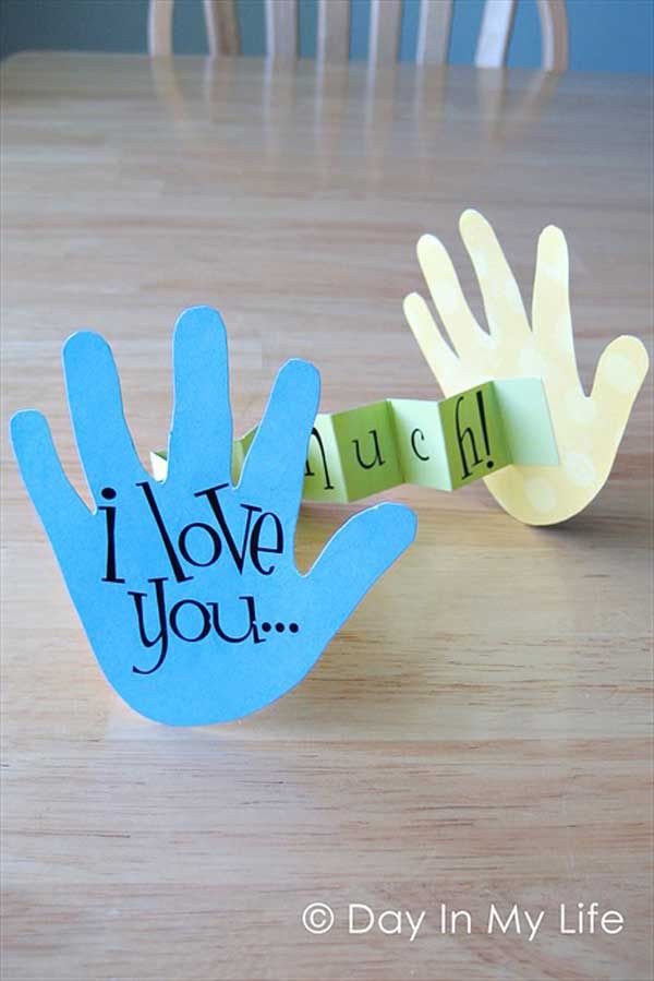 This could be a great project for kids out there. Outline your hands and create two cutouts which would serve as the cover. Then have the message in between just like a unique card.