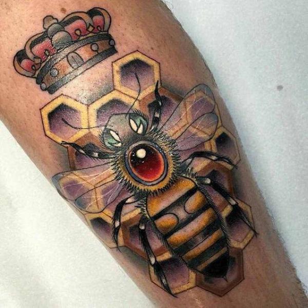 Honeycomb and bee with crown tattoo