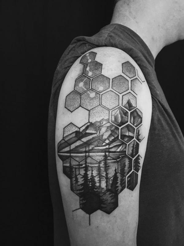 Honeycomb and landscape tattoo black and grey