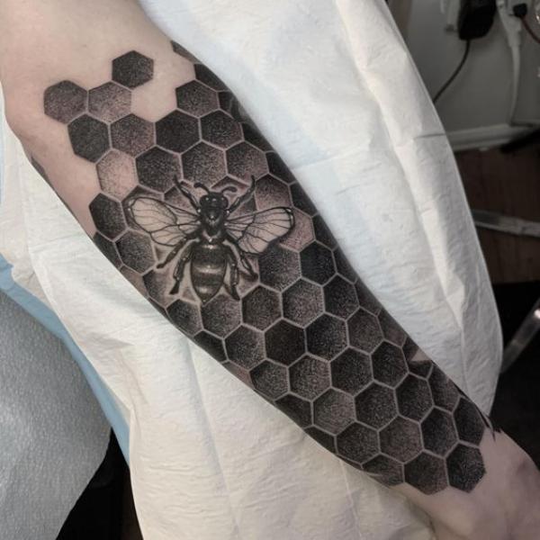 Honeycomb blackwork tattoo