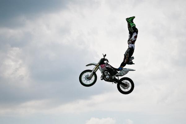photo of Handstand on a motorcycle in the air