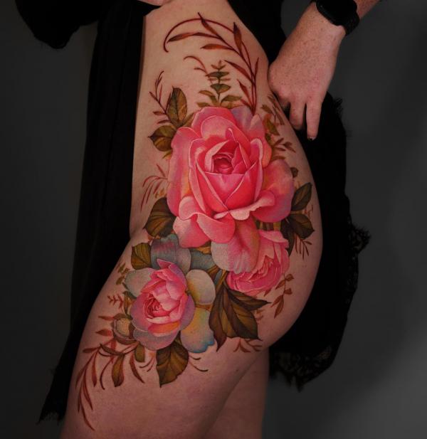 Pink rose on the side of hip