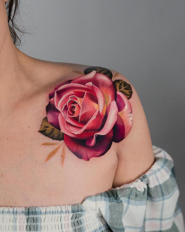 Pink rose shoulder tattoo