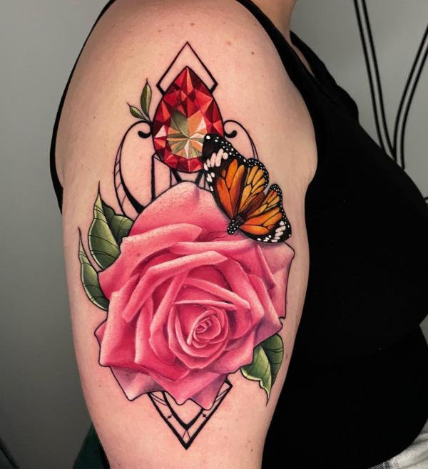 Pink rose with butterfly and diamond tattoo