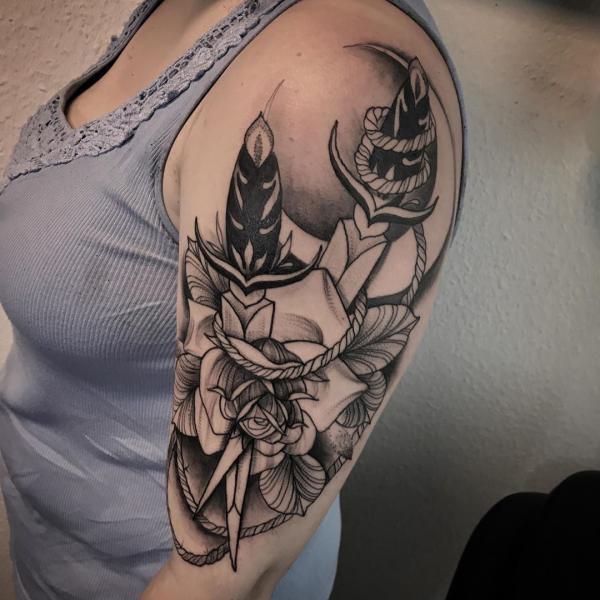 Black and white rose and dagger tattoo sleeve