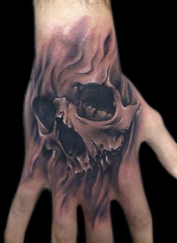 Realistic skull surrounded by Roses on full back with two water droplets