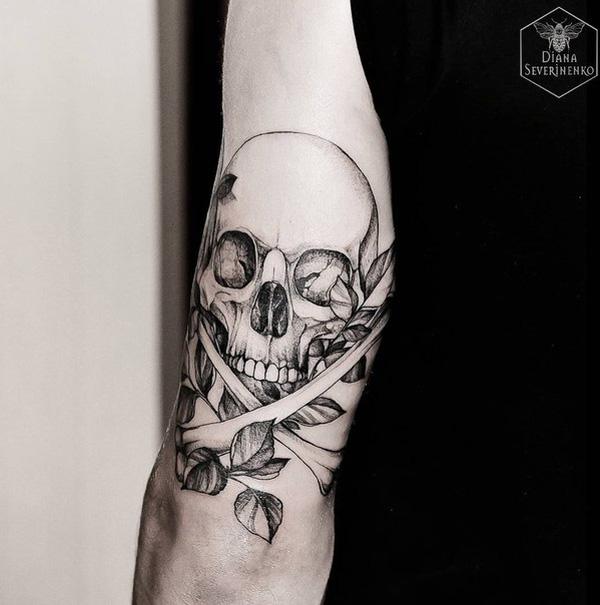 Black and white Sugar Skull tattoo on calf