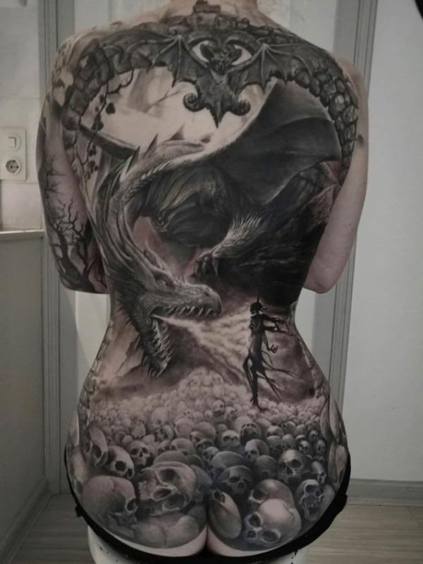 Dragon and skulls full back tattoo