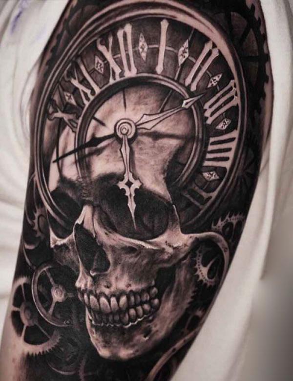 Skull and clock half sleeve tattoo