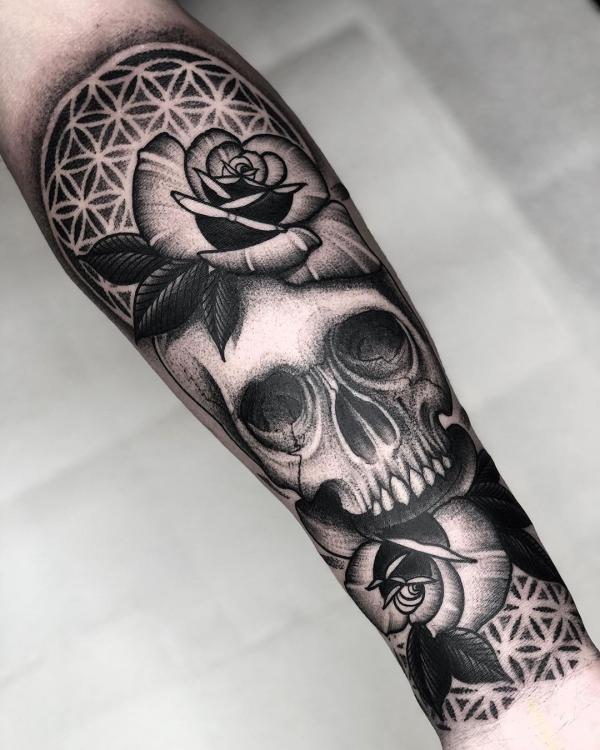 Skull and rose on flower of life backdrop
