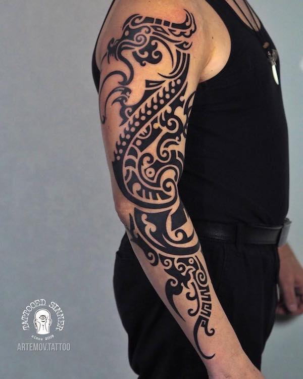 tribal full arm tattoo