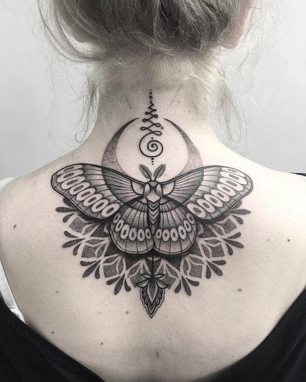 Crescent mandala symmetry butterfly tattoo on the neck