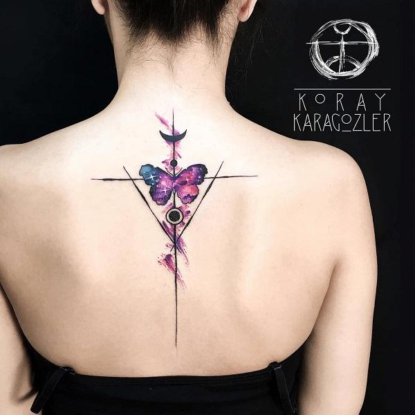 A tattoo of Minimalist galaxy within a butterfly on the back