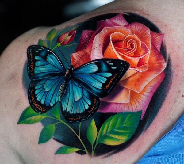 Ink of a butterfly and rose with vibrant colors