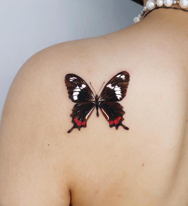 butterfly tattoo of Gorgeous design of a single butterfly on the shoulder