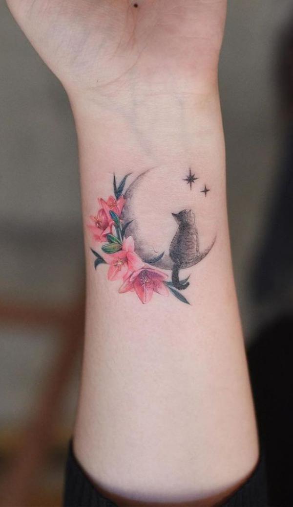 Cat on crescent moon with lily flowers