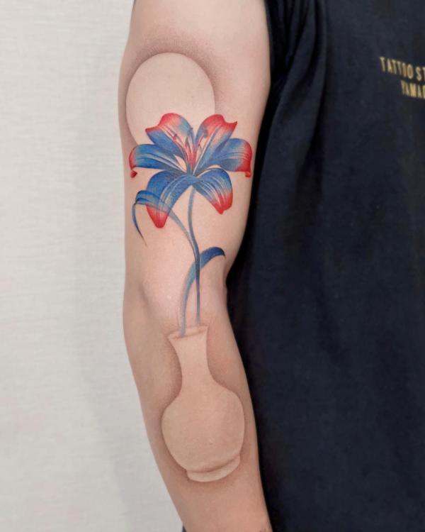 Colored lily with negative space vase and sun