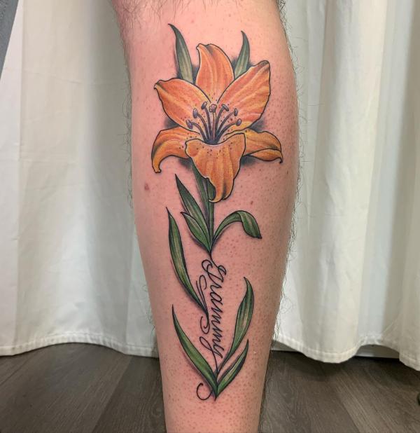 Lilly tattoo with word Grammy
