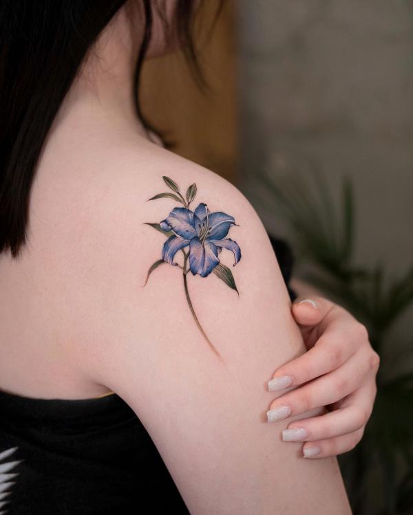 Blue lily | Lily flower tattoos, Lily tattoo design, Blue flower tattoos
