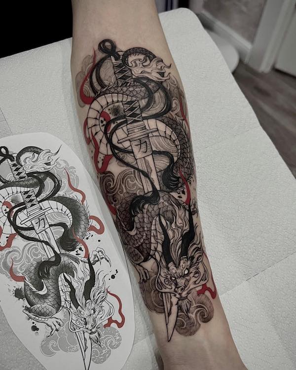 A samurai sword piercing a dragon