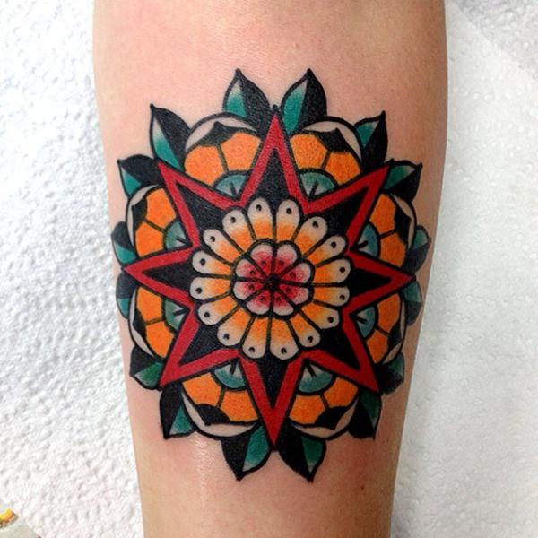 Colorful star and mandala tattoo traditional