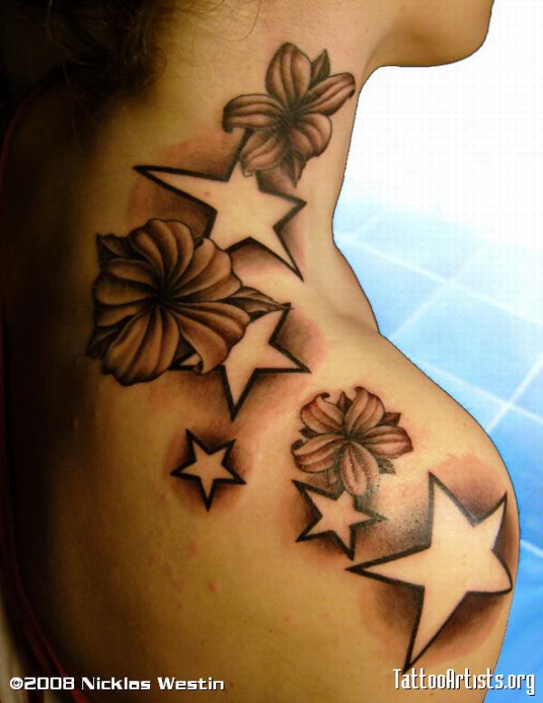 Lily and star shoulder tattoo