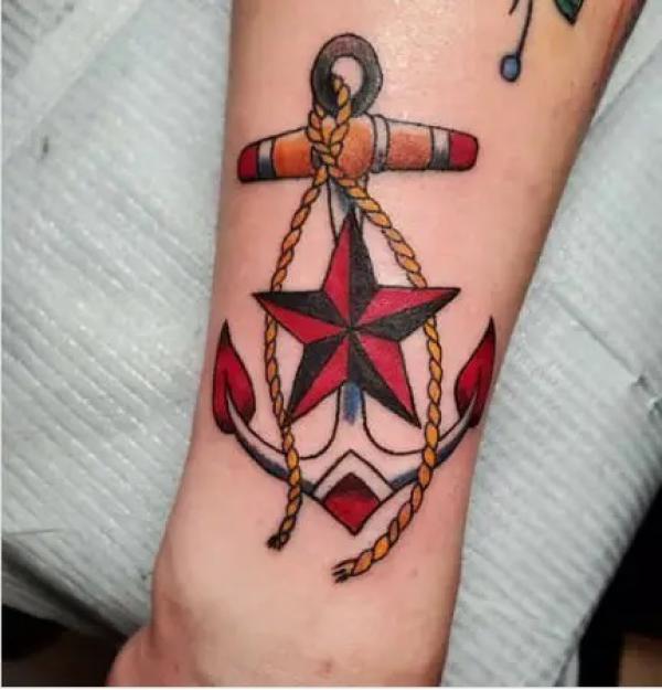 Nautical star and anchor tattoo design