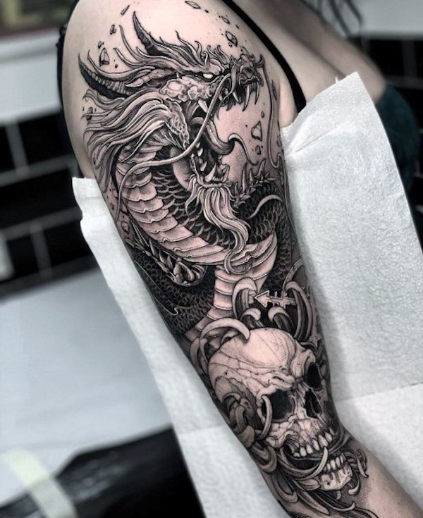 Skull and dragon tattoo