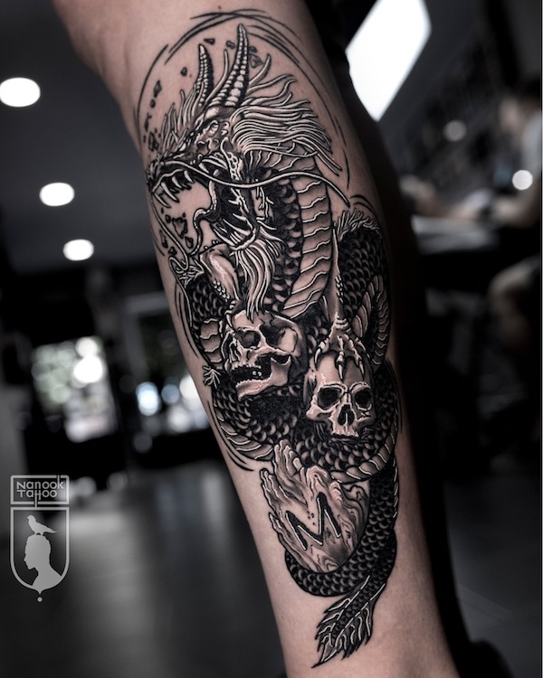 Skulls and dragon tattoo