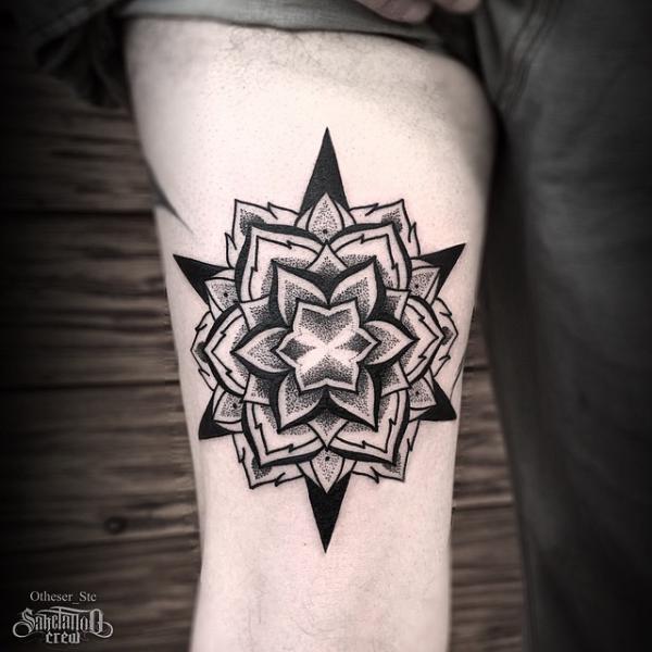 Star flower dotwork tattoo on forearm