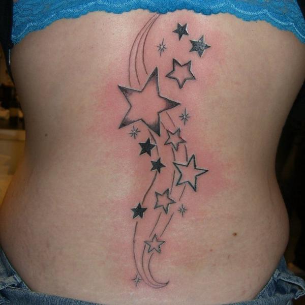 Swirling stars back tattoo